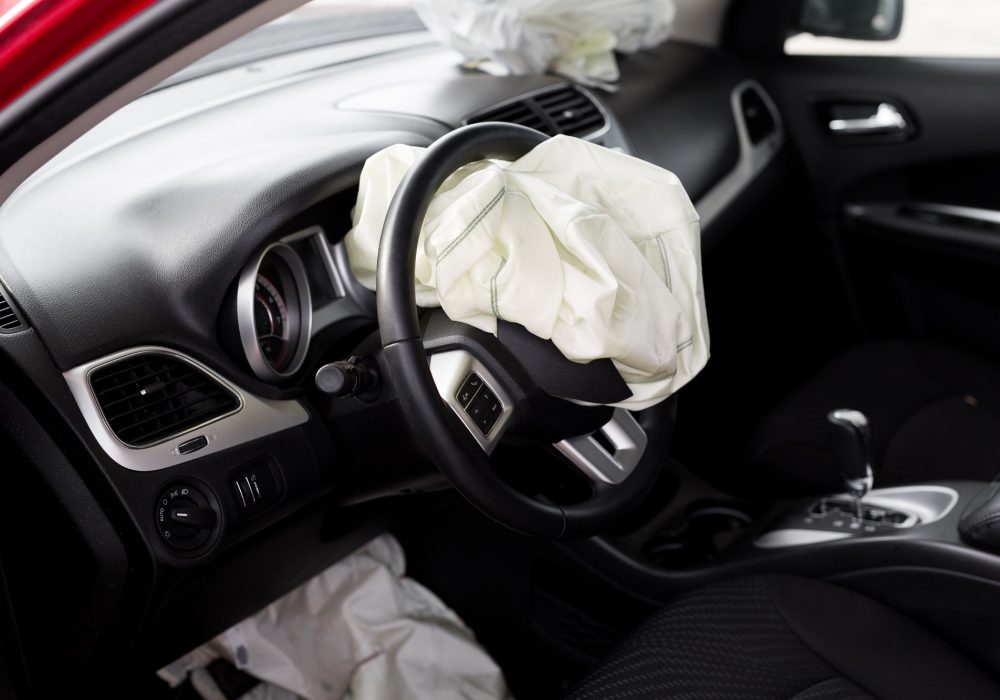 Airbag exploded at a car accident. Car Crash